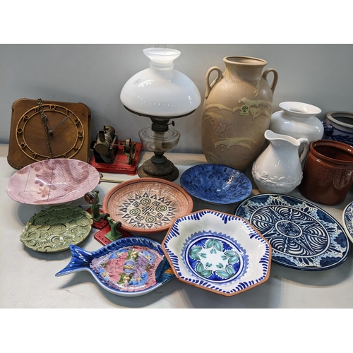 344 - A mixed lot to include two German salt glazed pots, an oil lamp, vintage wall clock, large twin hand... 