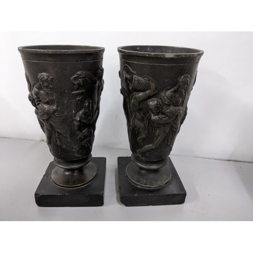 370 - A pair of neoclassical cast metal vases mounted on square slate bases, 17.5cm high
Location:6.1