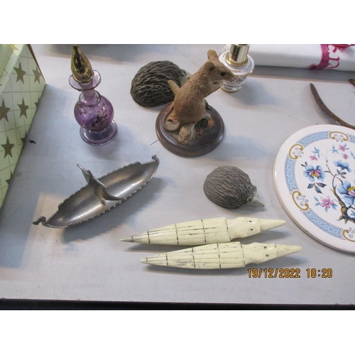 372 - A mixed lot to include Mdina glass, Rosebud miniature bride doll, Playmobil 1970's together with Sha... 