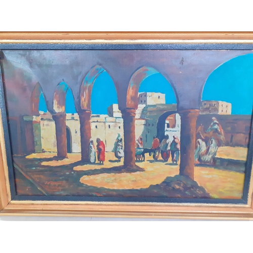 47 - An oil on canvas of a North African/Middle Eastern scene under the archway, signed T.B**K*Y to the l... 