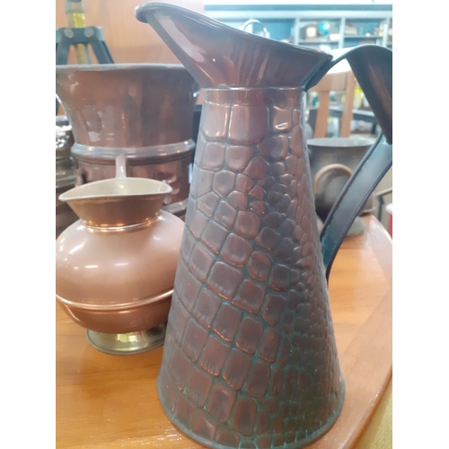 57 - Mixed 20th century copper, brass and silver plate to include an Indian brass planter and horse brass... 