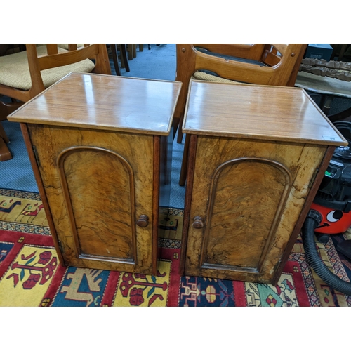 59 - A pair of Victorian and later walnut veneered bedside tables