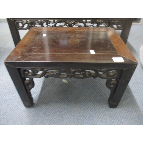 69 - A Chinese carved hardwood low table and a matching smaller table, the larger 28 x 79.5 x 44cm Locati... 