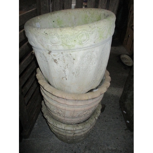 78 - A weathered garden concrete planter on stand decorated with a continuous frieze in relief of dancing... 