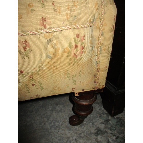 81 - A Victorian mahogany upholstered armchair on turned front legs and ceramic casters
Location:G