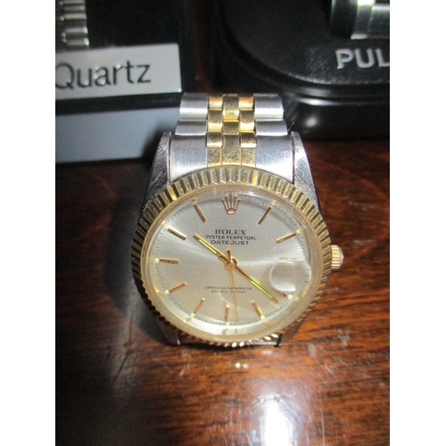 98 - A modern quartz wristwatch comprising a branded Seiko automatic navigator timer in a Pulsar box, a L... 