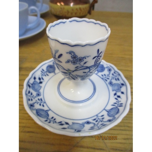 217 - Ceramics and glass to include four Meissen blue and white onion pattern egg cups, a Poole sky blue p... 