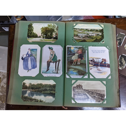 221 - An album of approximately four hundred postcards to include historical buildings, greeting cards Alb... 