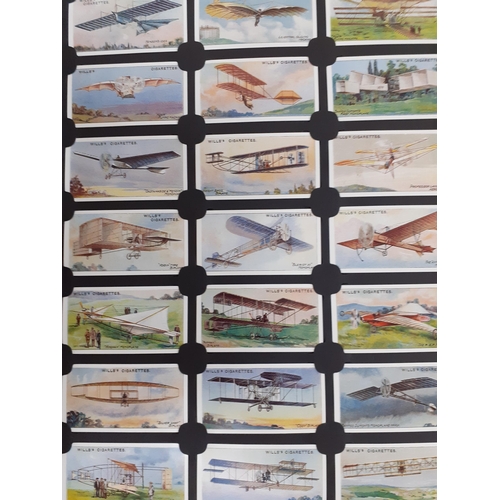 445 - A Card Collectors Society album of cigarette cards and mixed tea card albums together with a large q... 