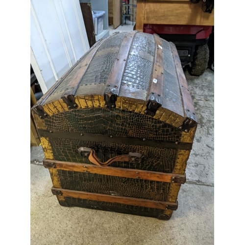 513 - An early 20th century faux crocodile and pine clad trunk with metal bands and clasps
Location:G