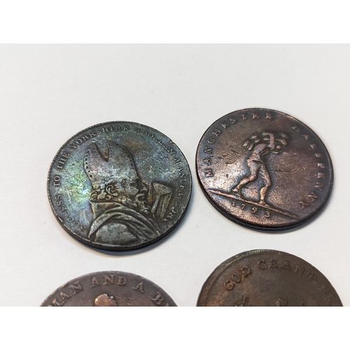 185 - A group of four tokens to include 1793 Leeds halfpenny, 1793 Manchester halfpenny, 'Am I Not A Man a... 