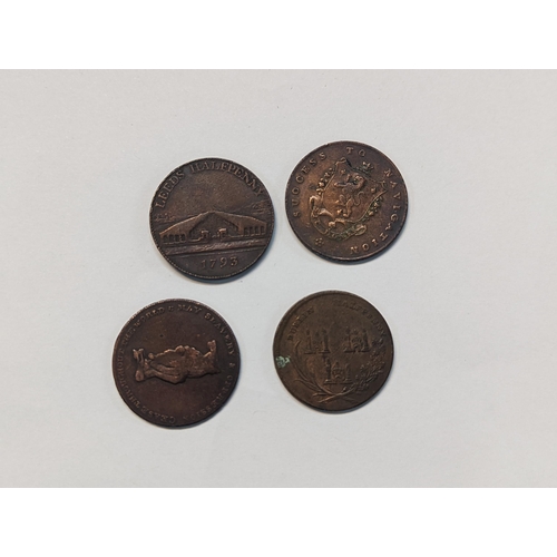 185 - A group of four tokens to include 1793 Leeds halfpenny, 1793 Manchester halfpenny, 'Am I Not A Man a... 