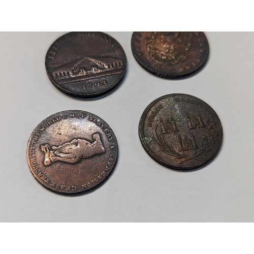 185 - A group of four tokens to include 1793 Leeds halfpenny, 1793 Manchester halfpenny, 'Am I Not A Man a... 