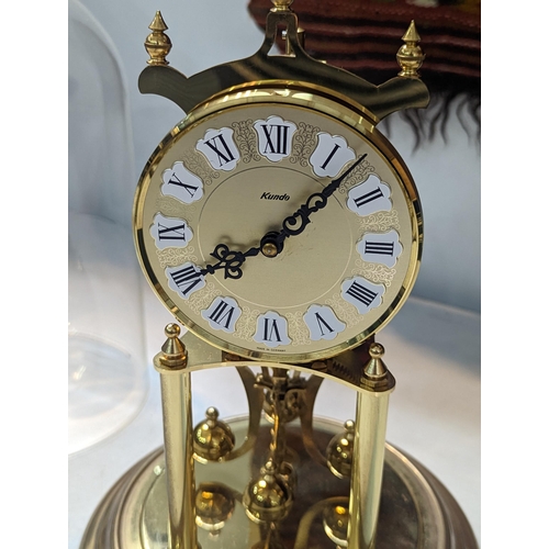 193 - A modern Anniversary Clock by Kiennger & Obergfell, made in Germany, having Roman numerals, the dial... 