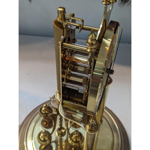 193 - A modern Anniversary Clock by Kiennger & Obergfell, made in Germany, having Roman numerals, the dial... 