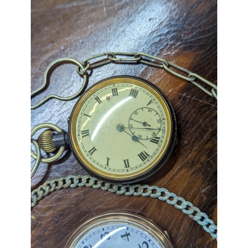 263 - A vintage Dennison gold plated open face pocket watch, together with another French example Location... 