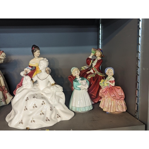 383 - A collection of Royal Doulton figures to include Antoinette, Gail, Cissie and others, along with a B... 