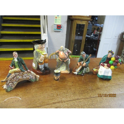 110 - A group of Royal Doulton figurines, Toby and character jugs to include Robert Burns HN3641, Falstaff... 