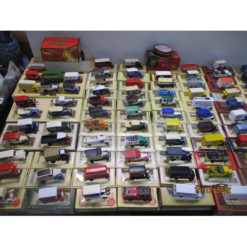 129 - A large quantity of Lledo diecast model cars, both boxes and cars loose, to include a Sarsons Ltd vi... 