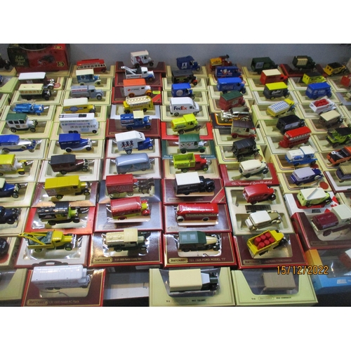 129 - A large quantity of Lledo diecast model cars, both boxes and cars loose, to include a Sarsons Ltd vi... 