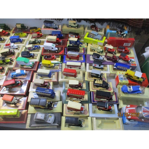 129 - A large quantity of Lledo diecast model cars, both boxes and cars loose, to include a Sarsons Ltd vi... 