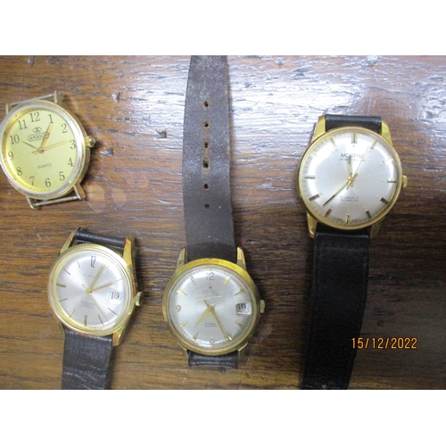 203 - A group of wristwatches to include a Montine 17-jewel manual wind watch, an Exodo and Albana automat... 