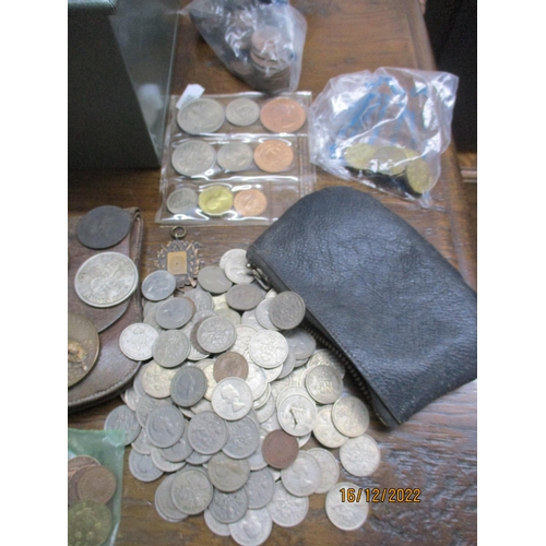 205 - A cash tin containing various British coinage and medals to include a copper George III halfpenny, s... 