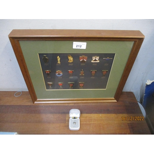 212 - Framed and glazed collection of miniature Rover car badges and a boxed tie pin Location:R2.3