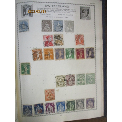 215 - An early 20th century Triumph Stamp album containing mounted world stamps including China, Straits S... 