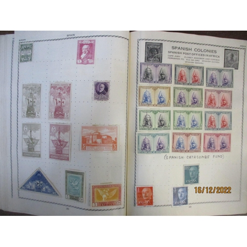 215 - An early 20th century Triumph Stamp album containing mounted world stamps including China, Straits S... 