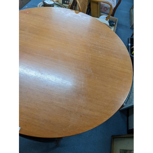 539 - A mid 20th century McIntosh teak circular extending dining table with six matching chairs
Location: ... 