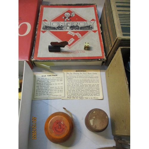 572 - A selection of games and toys to include a boxed tin plate Simplex portable typewriter, practical No... 