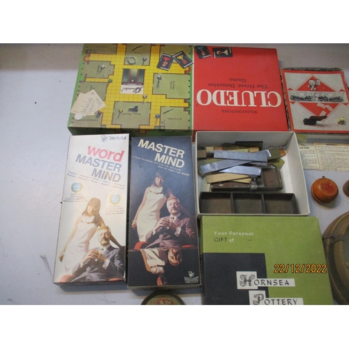 572 - A selection of games and toys to include a boxed tin plate Simplex portable typewriter, practical No... 