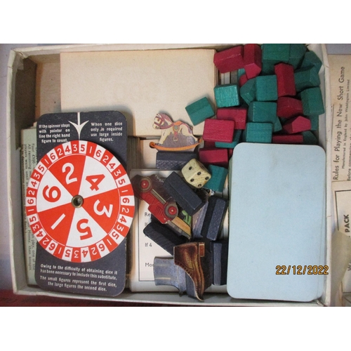 572 - A selection of games and toys to include a boxed tin plate Simplex portable typewriter, practical No... 