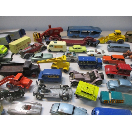 574 - A collection of vintage diecast model vehicles to include a Dinky Toys luxury coach, Lone Star roadm... 