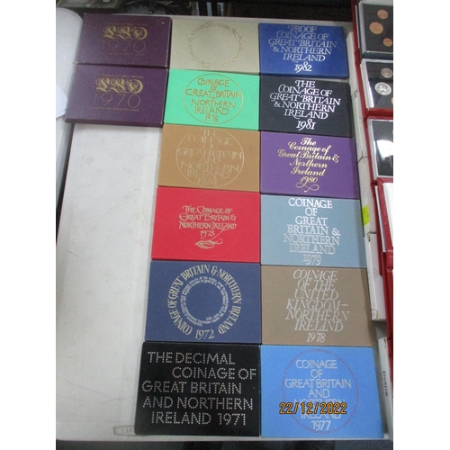 581 - A collection of Elizabeth II proof coin sets from 1970 x 2 to 2011, a near-unbroken series (year 200... 