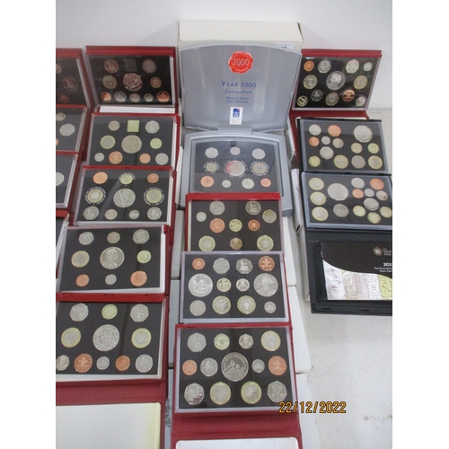 581 - A collection of Elizabeth II proof coin sets from 1970 x 2 to 2011, a near-unbroken series (year 200... 