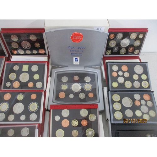 581 - A collection of Elizabeth II proof coin sets from 1970 x 2 to 2011, a near-unbroken series (year 200... 