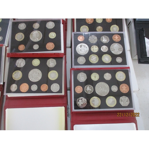 581 - A collection of Elizabeth II proof coin sets from 1970 x 2 to 2011, a near-unbroken series (year 200... 