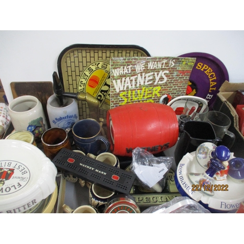 584 - A quantity of breweriana to include Watney barrels, Carlton ware and Wade ashtrays and pub jugs, tra... 