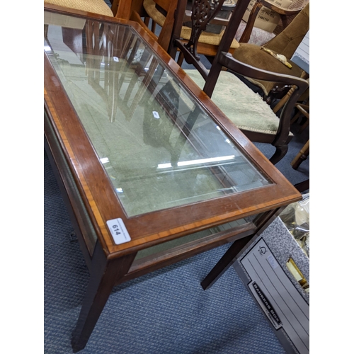 614 - A reproduction mahogany display coffee table having a hinged top with chenille lined interior, 46cm ... 