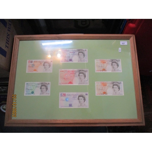 627 - A framed and glazed group of uncirculated £5, £10, £20 and £50 bank notes to include a Kentfield £50... 