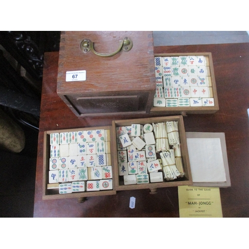 67 - An oak cased three drawer Mah Jong set with bone and bamboo tiles and rules leaflet
Location:8.2