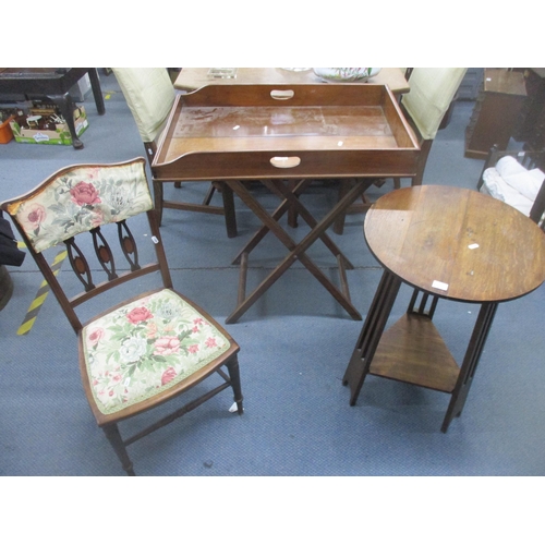 68 - An early 20th century mahogany butler's tray on stand, an oak two tier table in the Arts & Crafts st... 