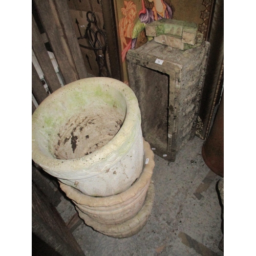 78 - A weathered garden concrete planter on stand decorated with a continuous frieze in relief of dancing... 