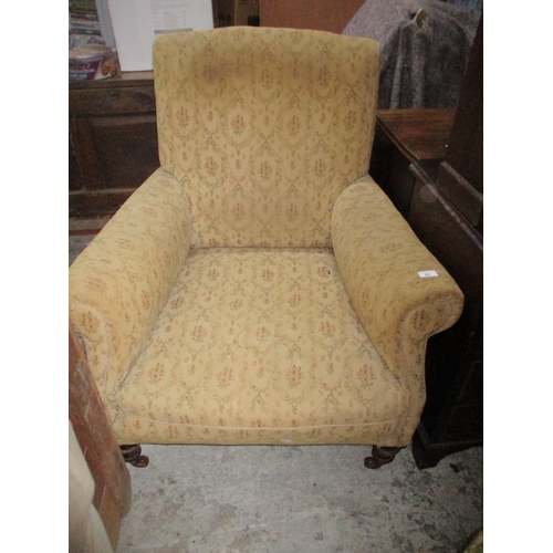 81 - A Victorian mahogany upholstered armchair on turned front legs and ceramic casters
Location:G