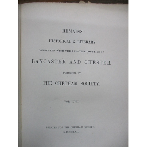 87 - An Edwardian mahogany bookstand with carved Greek key decoration along with a small group of books t... 