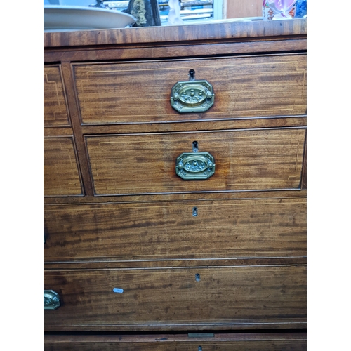 514 - A Victorian string inlaid mahogany Scottish chest of five short and three long drawers, on bracket f... 