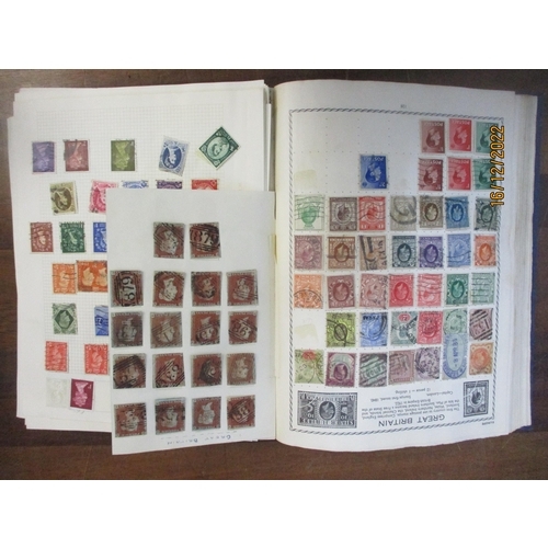 215 - An early 20th century Triumph Stamp album containing mounted world stamps including China, Straits S... 