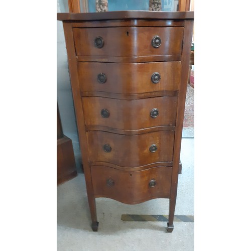 649 - Circa 1900, a serpentine fronted chest of five graduated drawers on square tapering legs with spade ... 